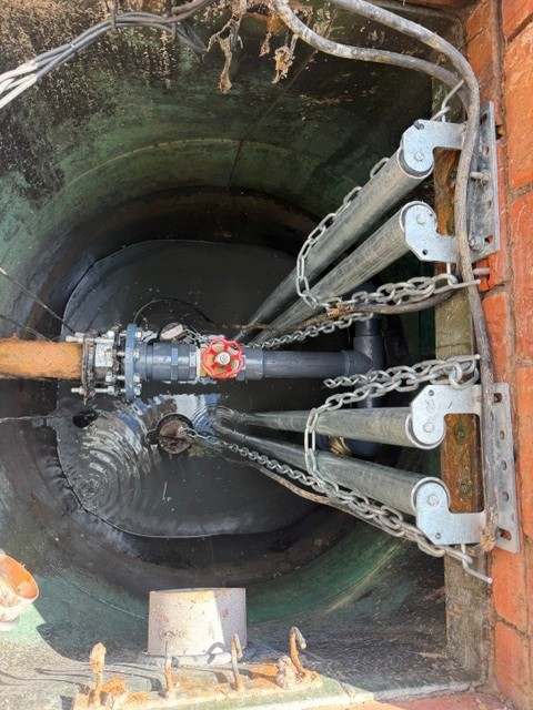 Completed pump station pipework, guide rails and lifting chains